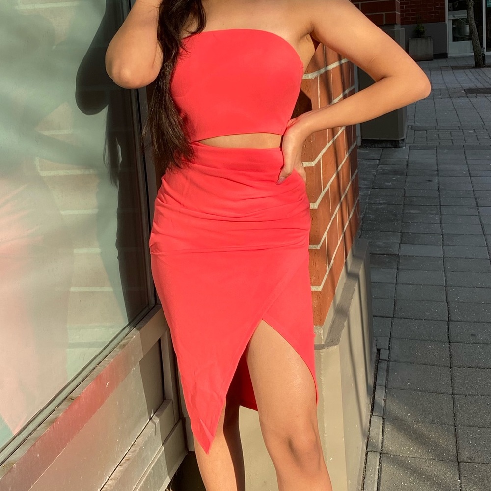 Bright pink bodycon asymmetrical dress